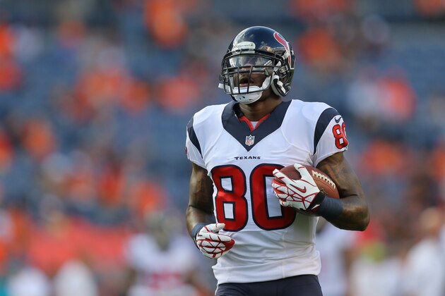 DENVER, CO - AUGUST 23:  Wide receiver Andre Johnson #80 of the Houston Texans warms up before a preseason game against the Denver Broncos at Sports Authority Field at Mile High on August 23, 2014 in Denver, Colorado.  (Photo by Justin Edmonds/Getty Images)