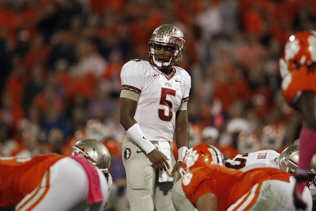 Florida State quarterback Jameis Winston (5) during the first half of an NCAA college football game, Saturday, Oct. 19, 2013, in Clemson, S.C. (AP Photo/Mike Stewart)