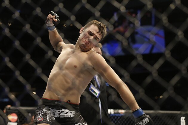 Myles Jury celebrates after beating Ramsey Nijem during the second round of a UFC lightweight mixed martial arts fight in San Jose, Calif., Saturday, April 20, 2013. Jury won by knock out in the second round. (AP Photo/Jeff Chiu)