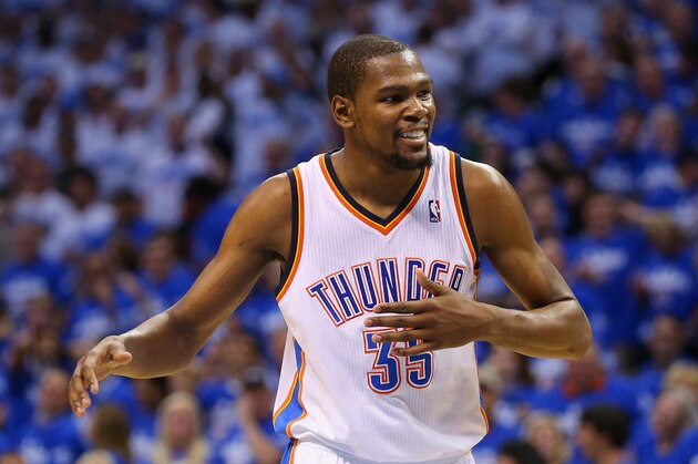 OKLAHOMA CITY, OK - MAY 27: Kevin Durant #35 of the Oklahoma City Thunder reacts to a play in the third quarter against the San Antonio Spurs during Game Four of the Western Conference Finals of the 2014 NBA Playoffs at Chesapeake Energy Arena on May 27, 2014 in Oklahoma City, Oklahoma. NOTE TO USER: User expressly acknowledges and agrees that, by downloading and or using this photograph, User is consenting to the terms and conditions of the Getty Images License Agreement.  (Photo by Ronald Martinez/Getty Images)
