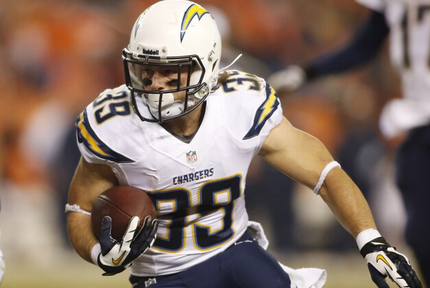 Dec 12, 2013; Denver, CO, USA; San Diego Chargers running back Danny Woodhead (39) runs with the ball during the first half against the Denver Broncos at Sports Authority Field at Mile High. Mandatory Credit: Chris Humphreys-USA TODAY Sports