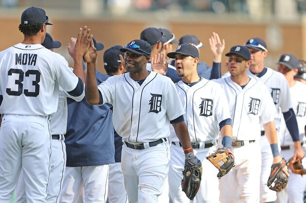 DETROIT, MI - SEPTEMBER 14: Torii Hunter #48 of the Detroit Tigers celebrates a win over the Cleveland Indians with his teammates at Comerica Park on September 14, 2014 in Detroit, Michigan. The Tigers defeated the Indians 6-4.  (Photo by Leon Halip/Getty Images)