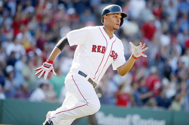 Boston Red Sox's Xander Bogaerts runs on his RBI single in the seventh inning of a baseball game against the Baltimore Orioles in Boston, Sunday, July 6, 2014. (AP Photo/Michael Dwyer)