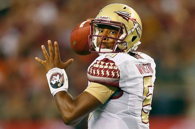 ARLINGTON, TX - AUGUST 30:  Jameis Winston #5 of the Florida State Seminoles passes against the Oklahoma State Cowboys in the first half of the Advocare Cowboys Classic at AT&T Stadium on August 30, 2014 in Arlington, Texas.  (Photo by Tom Pennington/Getty Images)