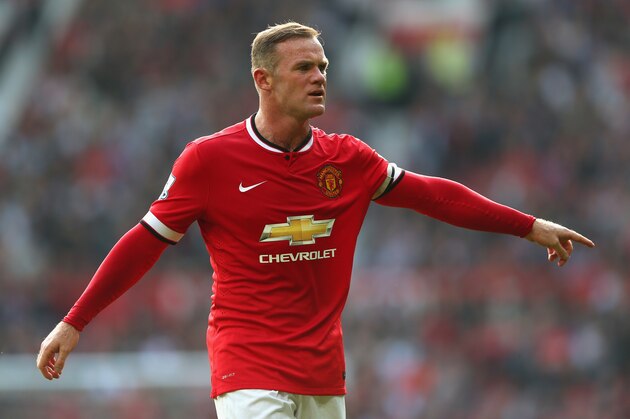 MANCHESTER, ENGLAND - SEPTEMBER 14:  Wayne Rooney of Manchester United gestures during the Barclays Premier League match between Manchester United and Queens Park Rangers at Old Trafford on September 14, 2014 in Manchester, England.  (Photo by Alex Livesey/Getty Images)