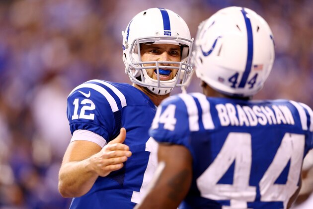 INDIANAPOLIS, IN - SEPTEMBER 15: Quarterback Andrew Luck #12 celebrates a fourth quarter touchdown with running back Ahmad Bradshaw #44 of the Indianapolis Colts against the Philadelphia Eagles during a game at Lucas Oil Stadium on September 15, 2014 in Indianapolis, Indiana.  (Photo by Andy Lyons/Getty Images)