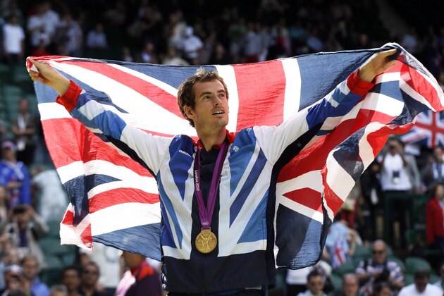 FILE - In this Sunday, Aug. 5, 2012 file photo, gold medalist Andy Murray of Great Britain waves the British flag during the medal ceremony of the men's singles event at the All England Lawn Tennis Club at Wimbledon, in London, at the 2012 Summer Olympics. Murray’s future status, as well as that of Scottish Olympic athletes, rests on the result of next week’s independence referendum in Scotland. Polls suggest the two sides are running neck-and-neck, presenting a real possibility that Scotland could break away after 307 years as part of the United Kingdom. If Scots vote ``yes’’ on Sept. 18, the decision won’t have much impact on football and rugby, as Scotland already fields its own teams in those sports. But it will affect Scotland’s status in the Olympics and raise doubts over whether Scots can send a team to Rio. By then, Murray could be representing an independent Scotland. (AP Photo/Elise Amendola, file)