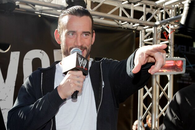 WWE Superstar CM Punk addresses the crowd at Madison Square Garden, Friday, Nov. 18, 2011, in New York, during a rally leading up to the 25th Anniversary of Survivor Series, taking place Sunday at Madison Square Garden.  The event will feature actor and wrestling favorite Dwayne
