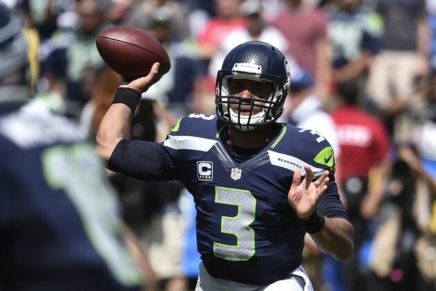 Seattle Seahawks quarterback Russell Wilson (3) throws a pass during the second half of an NFL football game against the San Diego Chargers on Sunday, Sept. 14, 2014, in San Diego. (AP Photo/Denis Poroy)