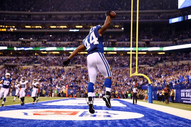 INDIANAPOLIS, IN - SEPTEMBER 15:  Running back Ahmad Bradshaw #44 of the Indianapolis Colts celebrates a fourth quarter touchdown against the Philadelphia Eagles during a game at Lucas Oil Stadium on September 15, 2014 in Indianapolis, Indiana.  (Photo by Andy Lyons/Getty Images)