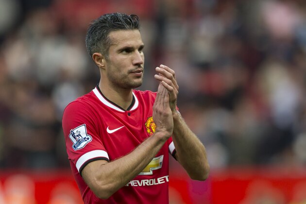 Manchester United's Robin van Persie is seen during his team's Queens Park Rangers' during their English Premier League soccer match at Old Trafford Stadium, Manchester, England, Sunday Sept. 14, 2014. (AP Photo/Jon Super)