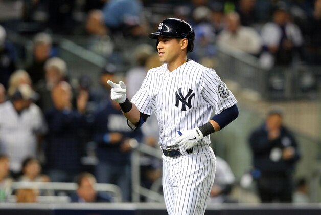 Sep 19, 2014; Bronx, NY, USA; New York Yankees center fielder Jacoby Ellsbury (22) reacts after hitting a two-run home run against the Toronto Blue Jays during the third inning at Yankee Stadium. Mandatory Credit: Brad Penner-USA TODAY Sports