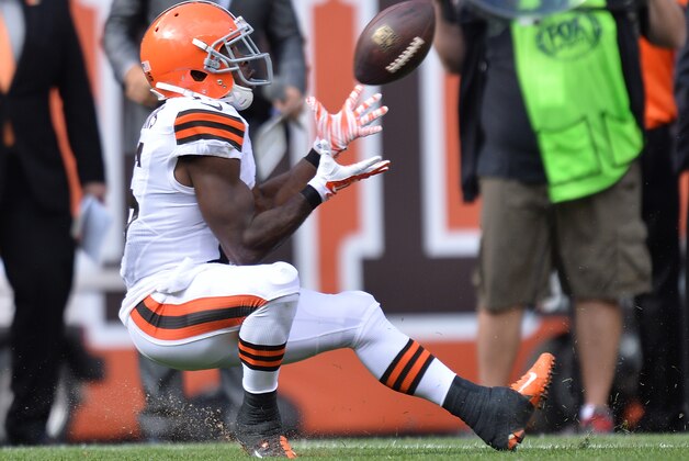 CLEVELAND, OH - SEPTEMBER 14:  Andrew Hawkins #16 of the Cleveland Browns makes a fourth quarter catch to set up the game winning field goal against the New Orleans Saints at FirstEnergy Stadium on September 14, 2014 in Cleveland, Ohio.  (Photo by Jamie Sabau/Getty Images)