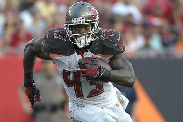 Tampa Bay Buccaneers running back Bobby Rainey (43) rushes for yardage during the second half of an NFL football game against the St. Louis Rams in Tampa, Fla., Sunday, Sept. 14, 2014.(AP Photo/Phelan M. Ebenhack)