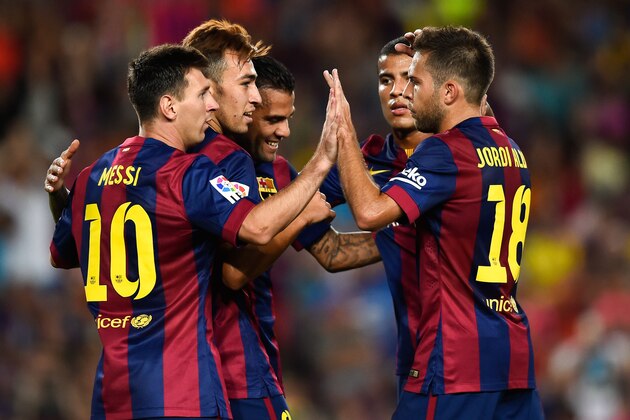 BARCELONA, SPAIN - AUGUST 18:  Munir (2nd,L) of FC Barcelona celebrates with his team-mates after scoring his team's fourth goal during the Joan Gamper Trophy match between FC Barcelona and Club Leon at Camp Nou on August 18, 2014 in Barcelona, Spain.  (Photo by David Ramos/Getty Images)