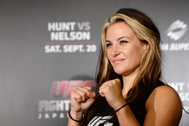 TOKYO, JAPAN - AUGUST 26:  Miesha Tate, UFC women's bantaweight poses for a photograph during a UFC press conference at Akasaka Garden City on August 26, 2014 in Tokyo, Japan.  (Photo by Atsushi Tomura/Getty Images)