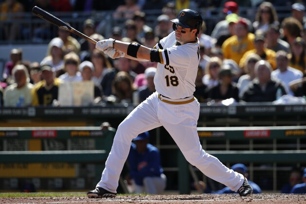 Pittsburgh Pirates' Neil Walker (18) drives in a run with a double off Chicago Cubs starting pitcher Jacob Turner during the fifth inning of a baseball game against the Chicago Cubs in Pittsburgh Sunday, Sept. 14, 2014. The Pirates won 7-3. (AP Photo/Gene J. Puskar)