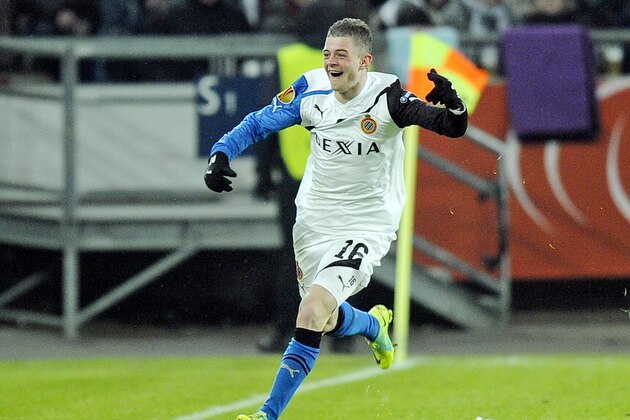 Brugge's Maxime Lestienne celebrates after scoring during the Europa League round of 32, first  leg soccer match between Hanover 96 and Club Brugge in Hanover, Germany, Thursday, Feb. 16, 2012. (AP Photo/Martin Meissner)