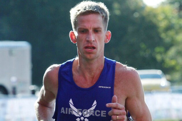 Air Force Captain Jacob Johnson, of Sherwood, Ark., crosses the finish line for second place in the 34th Annual Marine Corps Marathon with a time of 2 hours, 25 minutes and 2 seconds, in Arlington, Va., on Sunday, Oct. 25, 2009. (AP Photo/Jacquelyn Martin) Air Force Captain Jacob Johnson, of Sherwood, Ark., crosses the finish line for second place in the 34th Annual Marine Corps Marathon with a time of 2 hours, 25 minutes and 2 seconds, in Arlington, Va., on Sunday, Oct. 25, 2009. (AP Photo/Jacquelyn Martin)