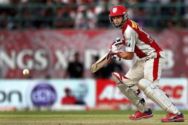 Kings XI Punjab's Adam Gilchrist plays a shot during an Indian Premier League cricket match against Chennai Super Kings in Dharmsala, India, Thursday, May 17, 2012. (AP Photo) INDIA OUT