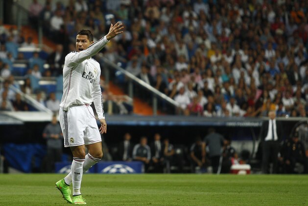 Real's Cristiano Ronaldo gestures during a Champions League final Group B soccer match between Real Madrid and FC Basel at the Santiago Bernabeu stadium in Madrid, Spain, Tuesday, Sept. 16, 2014. (AP Photo/Gabriel Pecot)