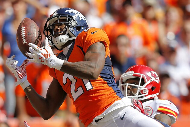 Denver Broncos cornerback Aqib Talib (21) breaks up a pass intended for Kansas City Chiefs wide receiver Dwayne Bowe during the first half of an NFL football game, Sunday, Sept. 14, 2014, in Denver. (AP Photo/Jack Dempsey)