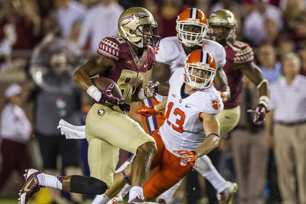 Florida State punt returner Rashad Greene takes off on a 28-yard return in the first half of an NCAA college football game against Clemson in Tallahassee, Fla., Saturday, Sept. 20, 2014. (AP Photo/Mark Wallheiser)