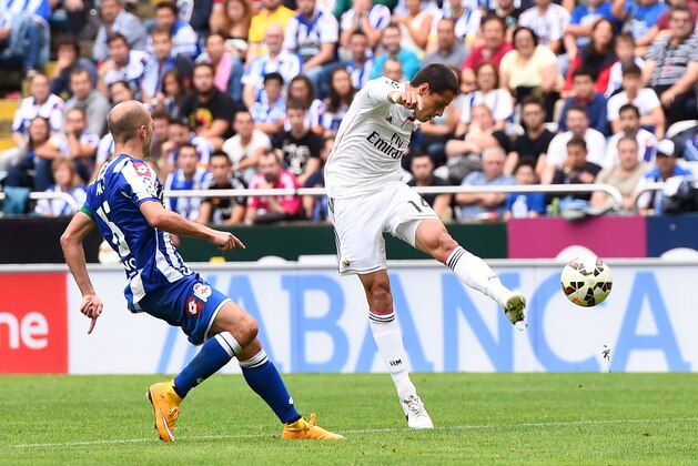 LA CORUNA, SPAIN - SEPTEMBER 20:  Chicharito Hernandez of Real Madrid CF scores his team's seventh goal during the La Liga match between RC Deportivo La Coruna and Real Madrid CF at Riazor Stadium on September 20, 2014 in La Coruna, Spain.  (Photo by David Ramos/Getty Images)