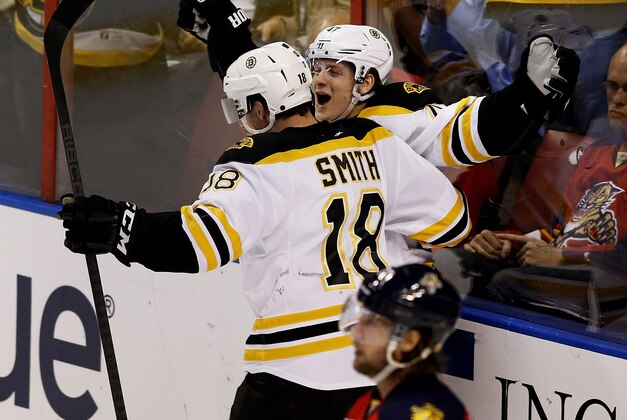 Mar 9, 2014; Sunrise, FL, USA; Boston Bruins defenseman Torey Krug (47) celebrates his goal against the Florida Panthers with  right wing Reilly Smith (18) in the third period at BB&T Center. The Bruins won 5-2. Mandatory Credit: Robert Mayer-USA TODAY Sports
