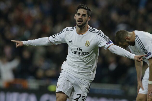 Real's Isco celebrates scoring his side's first goal during a Champions League quarterfinal first leg soccer match between Real Madrid and Borussia Dortmund at the Santiago Bernabeu stadium in Madrid, Spain, Wednesday April 2, 2014. (AP Photo/Paul White)