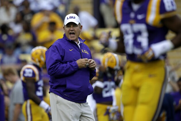 LSU head coach Les Miles calls pout inn the field before an NCAA college football game against Louisiana Monroe in Baton Rouge, La., Saturday, Sept. 13, 2014. (AP Photo/Gerald Herbert)