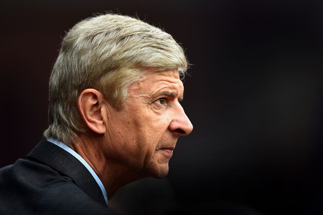 BIRMINGHAM, ENGLAND - SEPTEMBER 20: Arsene Wenger, manager of Arsenal looks on during the Barclays Premier League match between Aston Villa and Arsenal at Villa Park on September 20, 2014 in Birmingham, England.  (Photo by Laurence Griffiths/Getty Images)