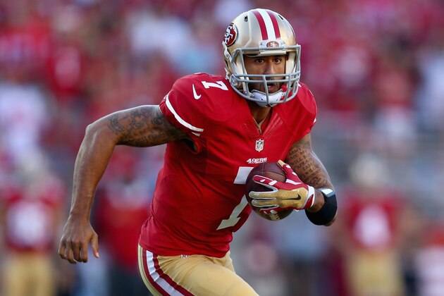 SANTA CLARA, CA - SEPTEMBER 14:  Quarterback Colin Kaepernick #7 of the San Francisco 49ers carries the ball against the Chicago Bears at Levi's Stadium on September 14, 2014 in Santa Clara, California.  (Photo by Jeff Gross/Getty Images)