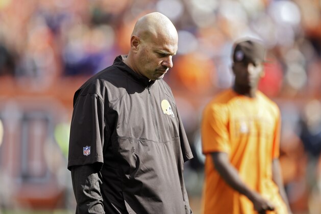 Cleveland Browns head coach Mike Pettine walks off the field after a 23-21 loss to the Baltimore Ravens in an NFL football game Sunday, Sept. 21, 2014, in Cleveland. (AP Photo/Tony Dejak)