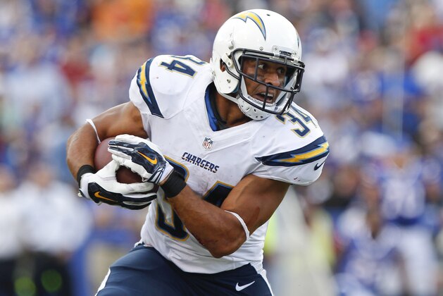 San Diego Chargers running back Donald Brown (34) rushes during the first half of an NFL football game against the Buffalo Bills Sunday, Sept. 21, 2014, in Orchard Park, N.Y. (AP Photo/Bill Wippert)