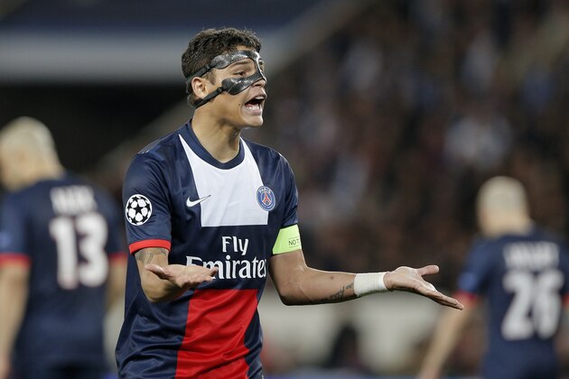 PSG's Thiago Silva gestures during the Champions League quarterfinal first leg soccer match between PSG and Chelsea, at the Parc des Princes stadium, in Paris, Wednesday, April 2, 2014. (AP Photo/Christophe Ena)