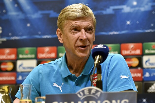 Arsenal manager Arsene Wenger talks to the media at a press conference in Dortmund, Germany, Monday, Sept. 15, 2014. Arsenal will play Borussia Dortmund in a Champion's League Group D soccer match on Tuesday in Dortmund. (AP Photo/Martin Meissner)
