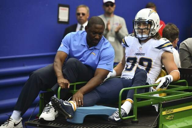 San Diego Chargers running back Danny Woodhead (39) is carted off the field after being injured on a play during the first half of an NFL football game against the Buffalo Bills, Sunday, Sept. 21, 2014, in Orchard Park, N.Y. (AP Photo/Gary Wiepert)