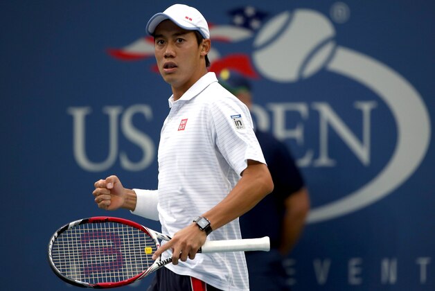 Kei Nishikori, of Japan, reacts during his match against Marin Cilic, of Croatia, during the championship of the 2014 U.S. Open tennis tournament, Monday, Sept. 8, 2014, in New York. Cilic won the championship. (AP Photo/Mike Groll)