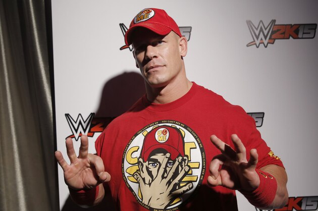 WWE 2K15 cover Superstar John Cena attends the WWE 2K15 SummerSlam Confidential Panel at Club Nokia, on Saturday, August 16, 2014 in Los Angeles. (Photo by Todd Williamson/Invision for 2K/AP Images)