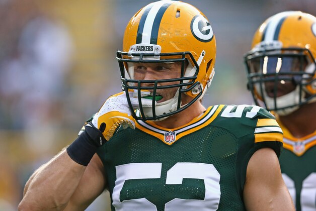 GREEN BAY, WI - AUGUST 22: Clay Matthews #52 of the Green Bay Packers participates in warm-ups before a preseason game against the Oakland Raiders at Lambeau Field on August 22, 2014 in Green Bay, Wisconsin. The Packers defeated the Raiders 31-21.  (Photo by Jonathan Daniel/Getty Images)