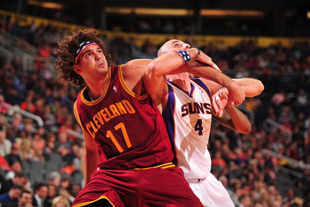PHOENIX, AZ - NOVEMBER 9:  Anderson Varejao #17 of the Cleveland Cavaliers battles for position with Marcin Gortat #4 of the Phoenix Suns on November 9, 2012 at U.S. Airways Center in Phoenix, Arizona. NOTE TO USER: User expressly acknowledges and agrees that, by downloading and or using this photograph, user is consenting to the terms and conditions of the Getty Images License Agreement. Mandatory Copyright Notice: Copyright 2012 NBAE (Photo by Barry Gossage/NBAE via Getty Images)