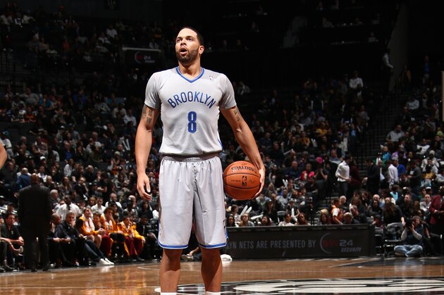 BROOKLYN, NY - MARCH 28: Deron Williams #8 of the Brooklyn Nets attempts a free throw against the Cleveland Cavaliers at the Barclays Center on March 28, 2014 in the Brooklyn borough of New York City.  NOTE TO USER: User expressly acknowledges and agrees that, by downloading and/or using this Photograph, user is consenting to the terms and conditions of the Getty Images License Agreement. Mandatory Copyright Notice: Copyright 2014 NBAE (Photo by Reid B. Kelley/NBAE via Getty Images)