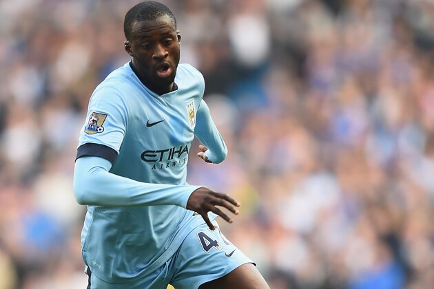 MANCHESTER, ENGLAND - SEPTEMBER 21:  Yaya Toure of Manchester City in action during the Barclays Premier League match between Manchester City and Chelsea at Etihad Stadium on September 21, 2014 in Manchester, England.  (Photo by Laurence Griffiths/Getty Images)