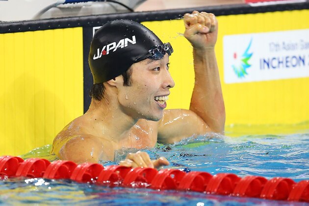 INCHEON, SOUTH KOREA - SEPTEMBER 21: Kosuke Hagino of Japan celebrates after winning gold in the Men's 200m Freestyle during day two of the 2014 Asian Games at Munhak Park Tae-Hwan Aquatics Center on September 21, 2014 in Incheon, South Korea.  (Photo by Brendon Thorne/Getty Images)