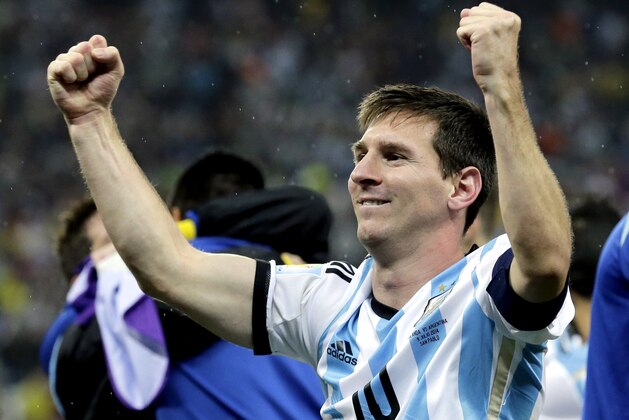 Argentina's Lionel Messi celebrates after Argentina defeated the Netherlands 4-2 in a penalty shootout after a 0-0 tie after extra time to advance to the finals during the World Cup semifinal soccer match between the Netherlands and Argentina at the Itaquerao Stadium in Sao Paulo Brazil, Wednesday, July 9, 2014. (AP Photo/Victor R. Caivano)