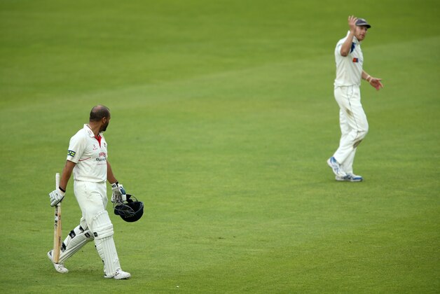 MANCHESTER, ENGLAND - SEPTEMBER 02:  Ashwell Prince of Lancashire and Andrew Gale of Yorkshire have words as they leave the field at the end of play during the LV County Championship match between Lancashire and Yorkshire at Old Trafford on September 2, 2014 in Manchester, England.  (Photo by Jan Kruger/Getty Images)