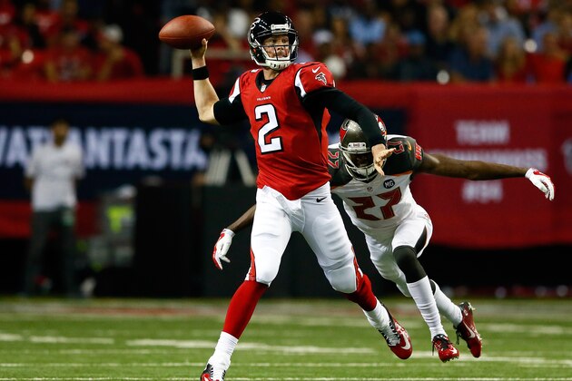 ATLANTA, GA - SEPTEMBER 18: Quarterback Matt Ryan #2 of the Atlanta Falcons passes under pressure from cornerback Johnthan Banks #27 of the Tampa Bay Buccaneers during a game at the Georgia Dome on September 18, 2014 in Atlanta, Georgia.  (Photo by Kevin C. Cox/Getty Images)