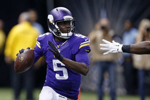 Minnesota Vikings quarterback Teddy Bridgewater (5) scrambles in the second half of an NFL football game against the New Orleans Saints in New Orleans, Sunday, Sept. 21, 2014. (AP Photo/Rogelio Solis)