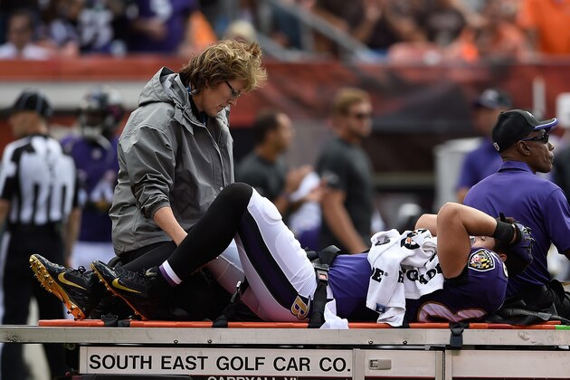 CLEVELAND, OH - SEPTEMBER 21:  Dennis Pitta #88 of the Baltimore Ravens is carted off the field after being injured in the second quarter against the Cleveland Browns at FirstEnergy Stadium on September 21, 2014 in Cleveland, Ohio.  (Photo by Jason Miller/Getty Images)